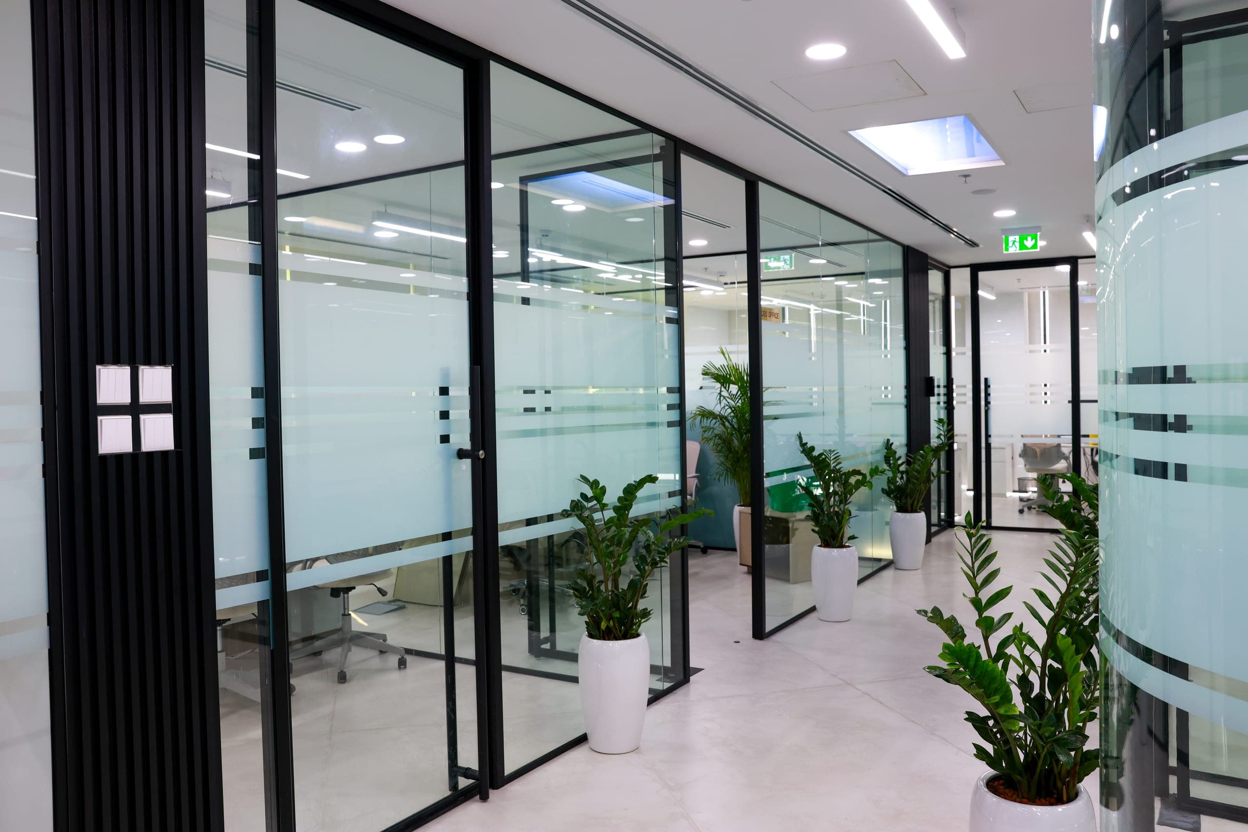 Aluminium framing set out to the office grid