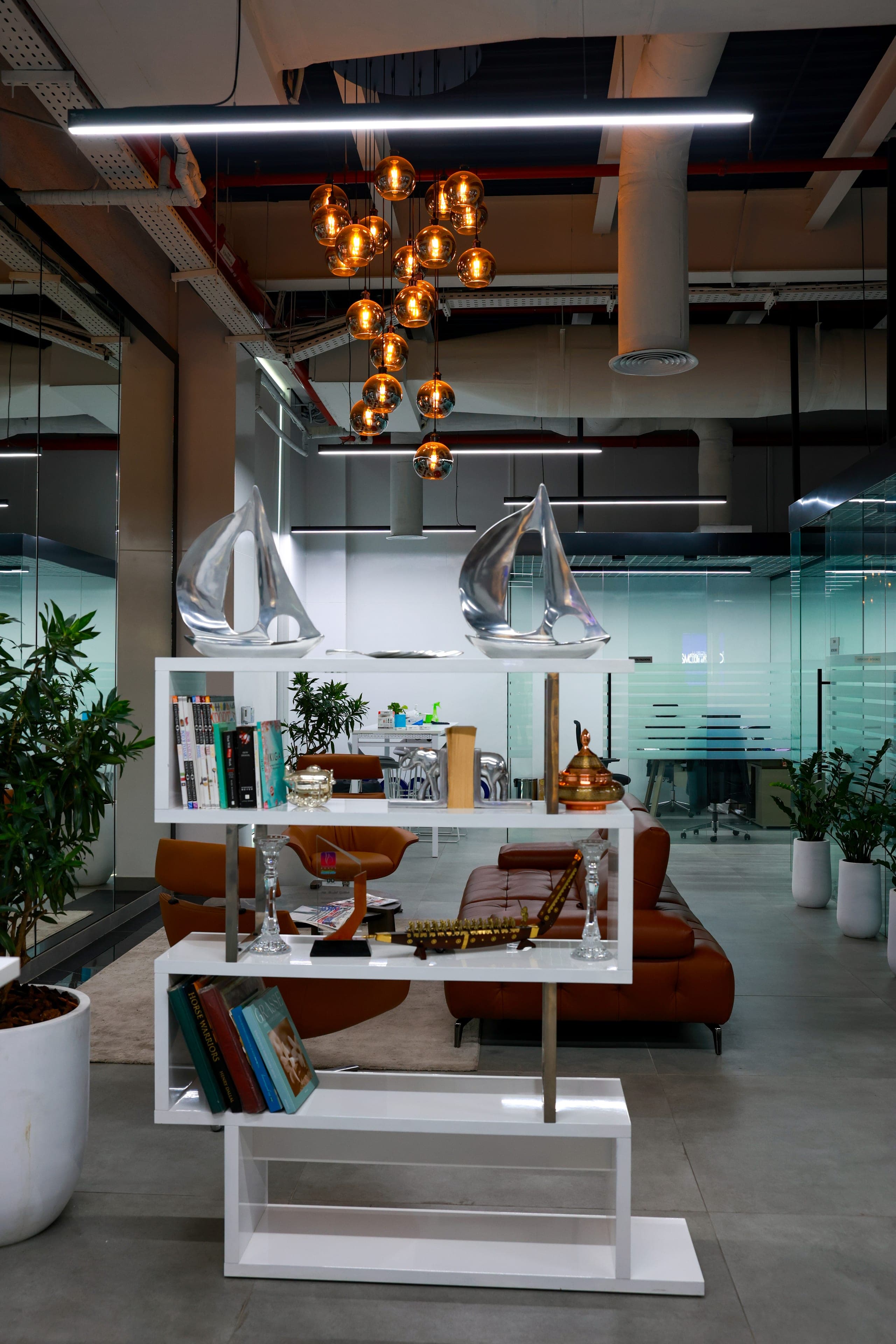 Open display shelving dividing lounge from walkway