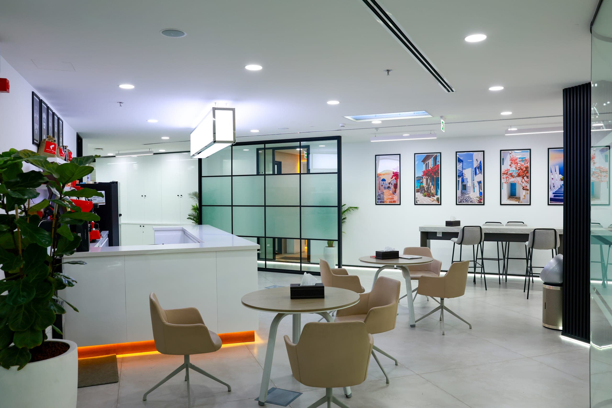 Break-out seating under cove-lit ceilings
