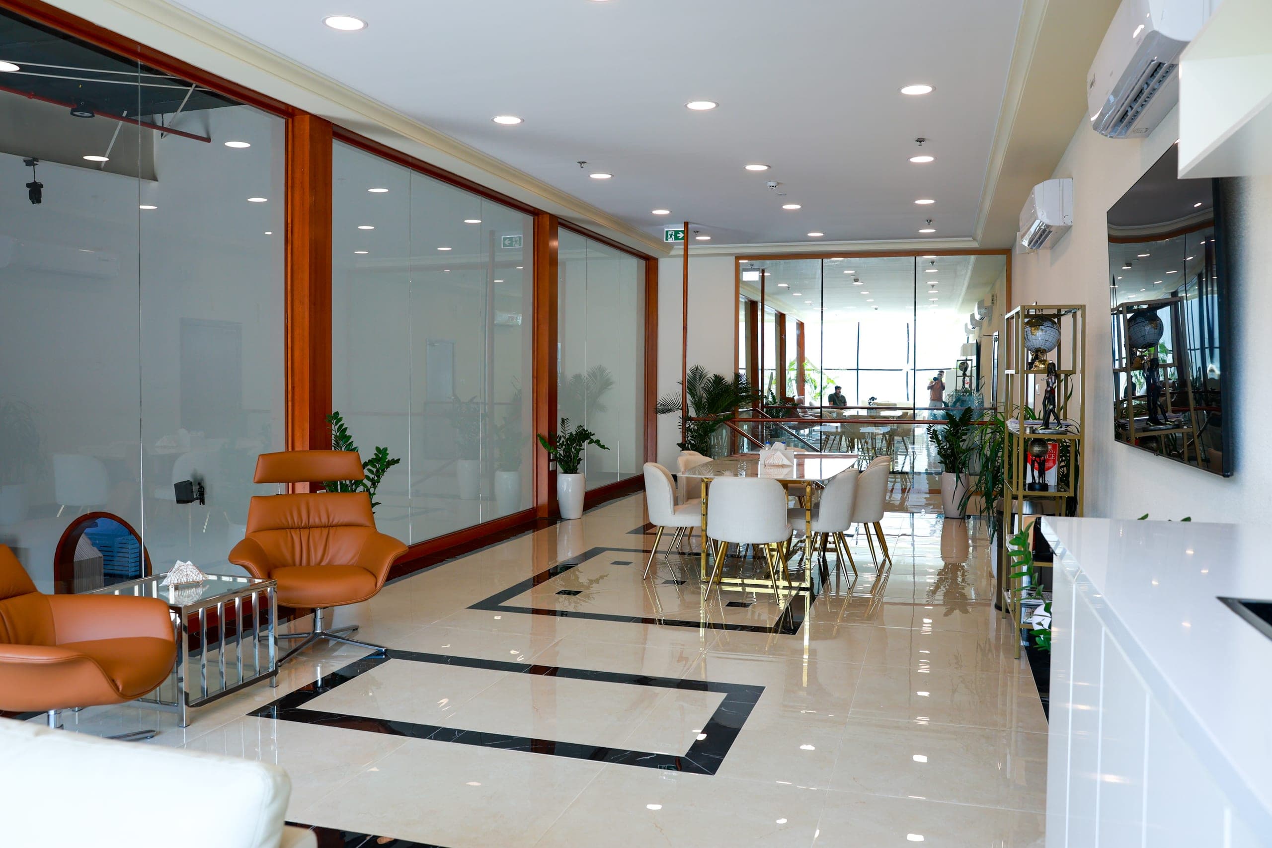 Timber-framed glazing enclosing a breakout area
