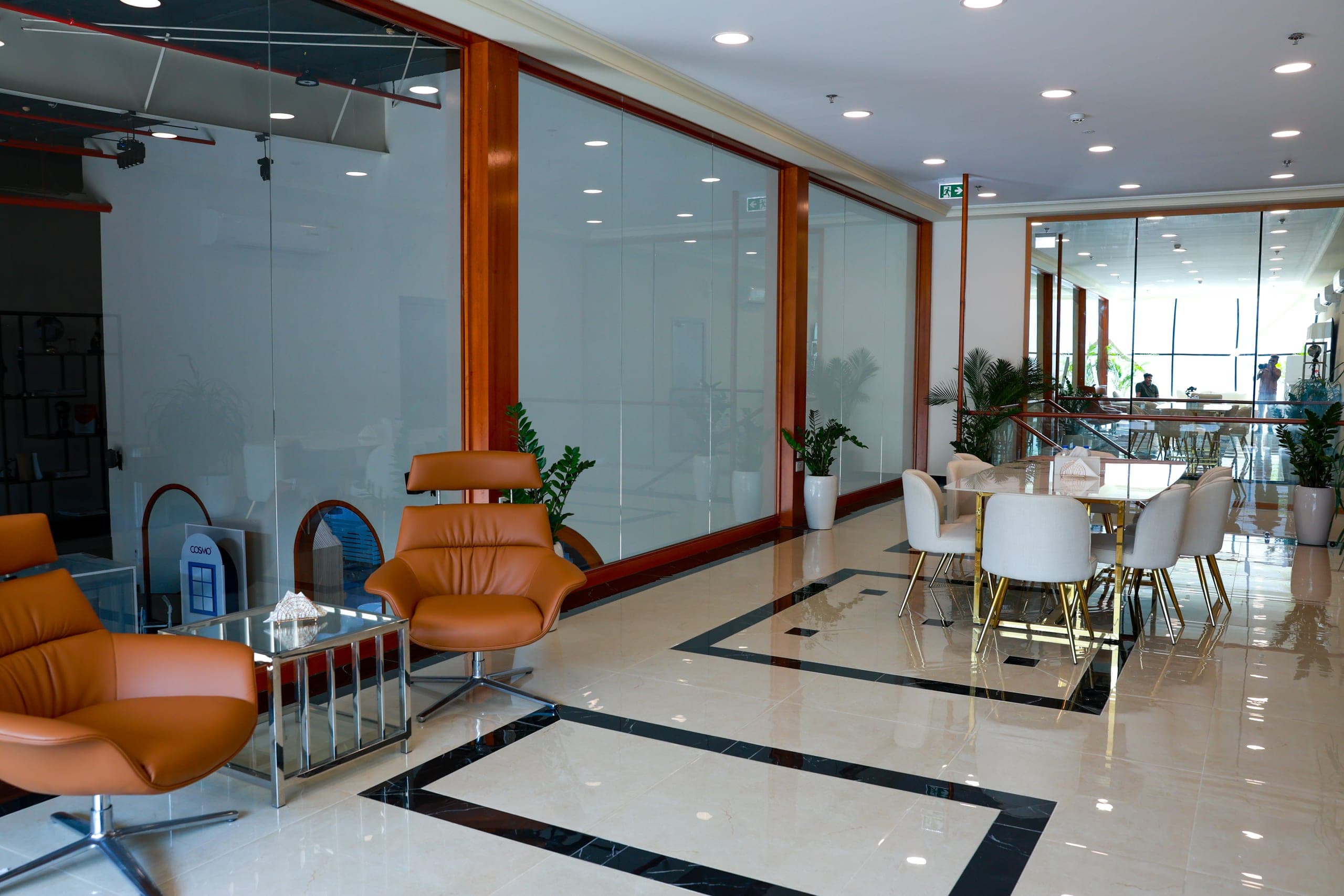 Tan seating within a timber-framed enclosure