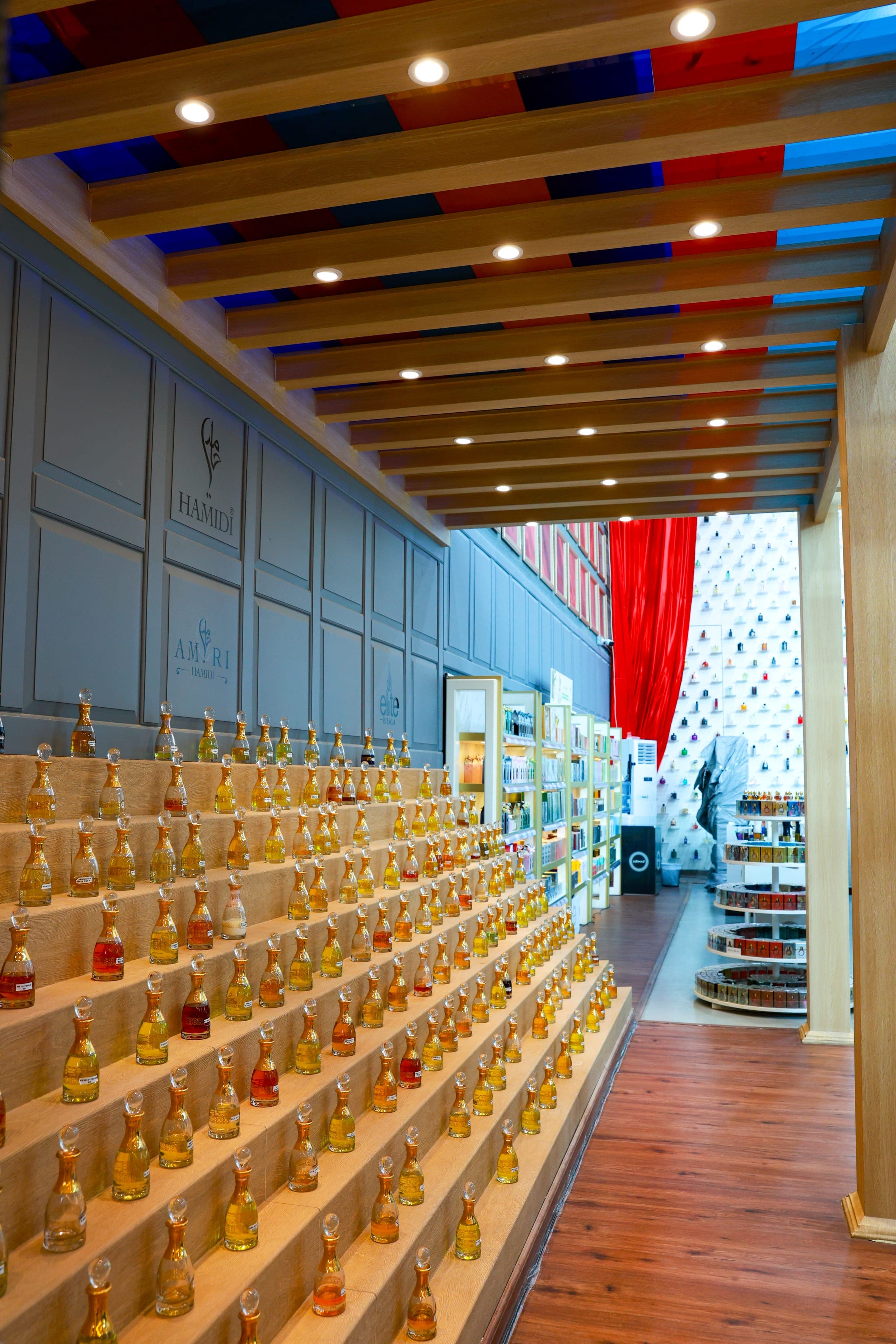 A blue-panelled display corridor