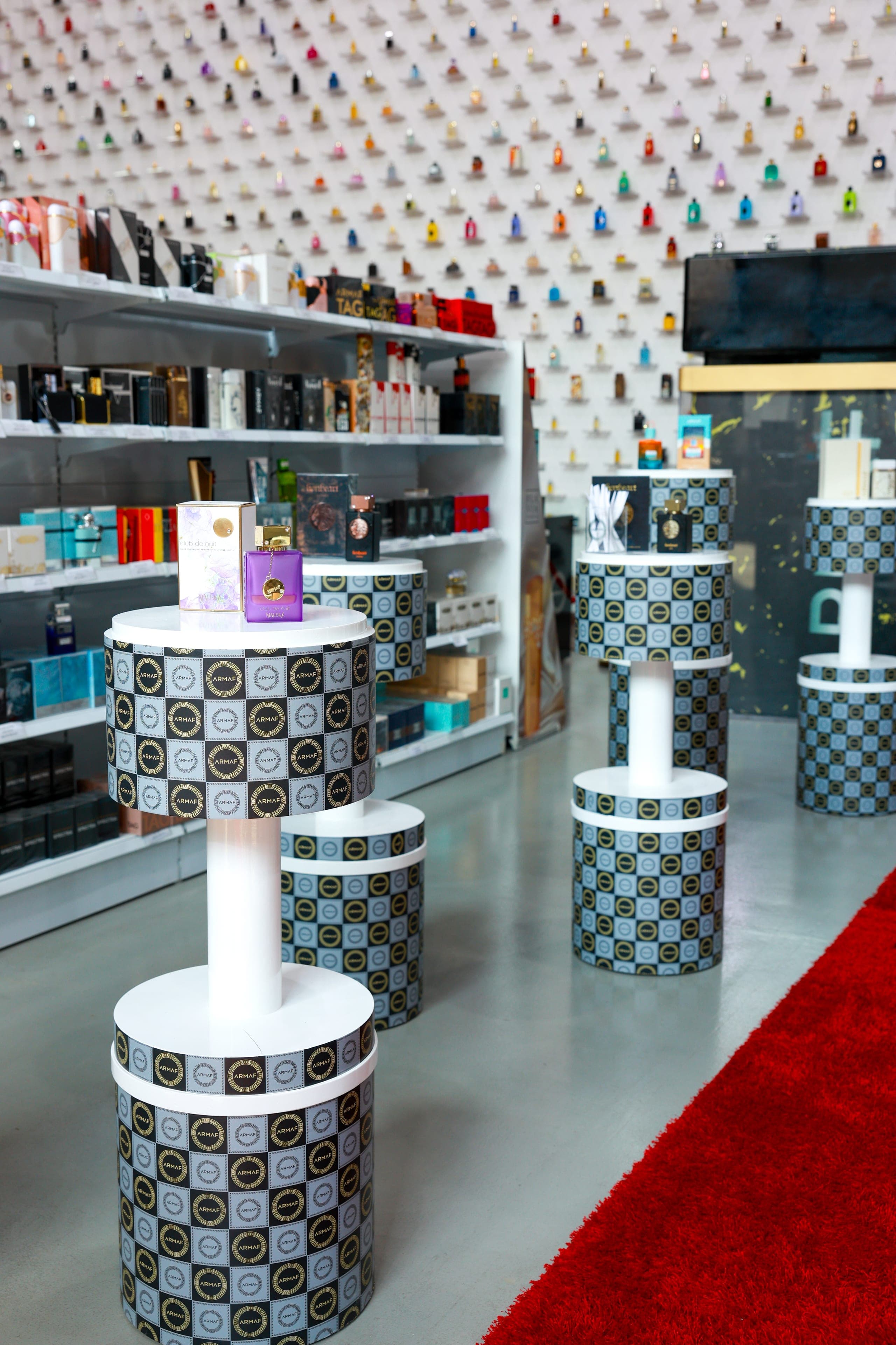 Freestanding display plinths on a polished floor