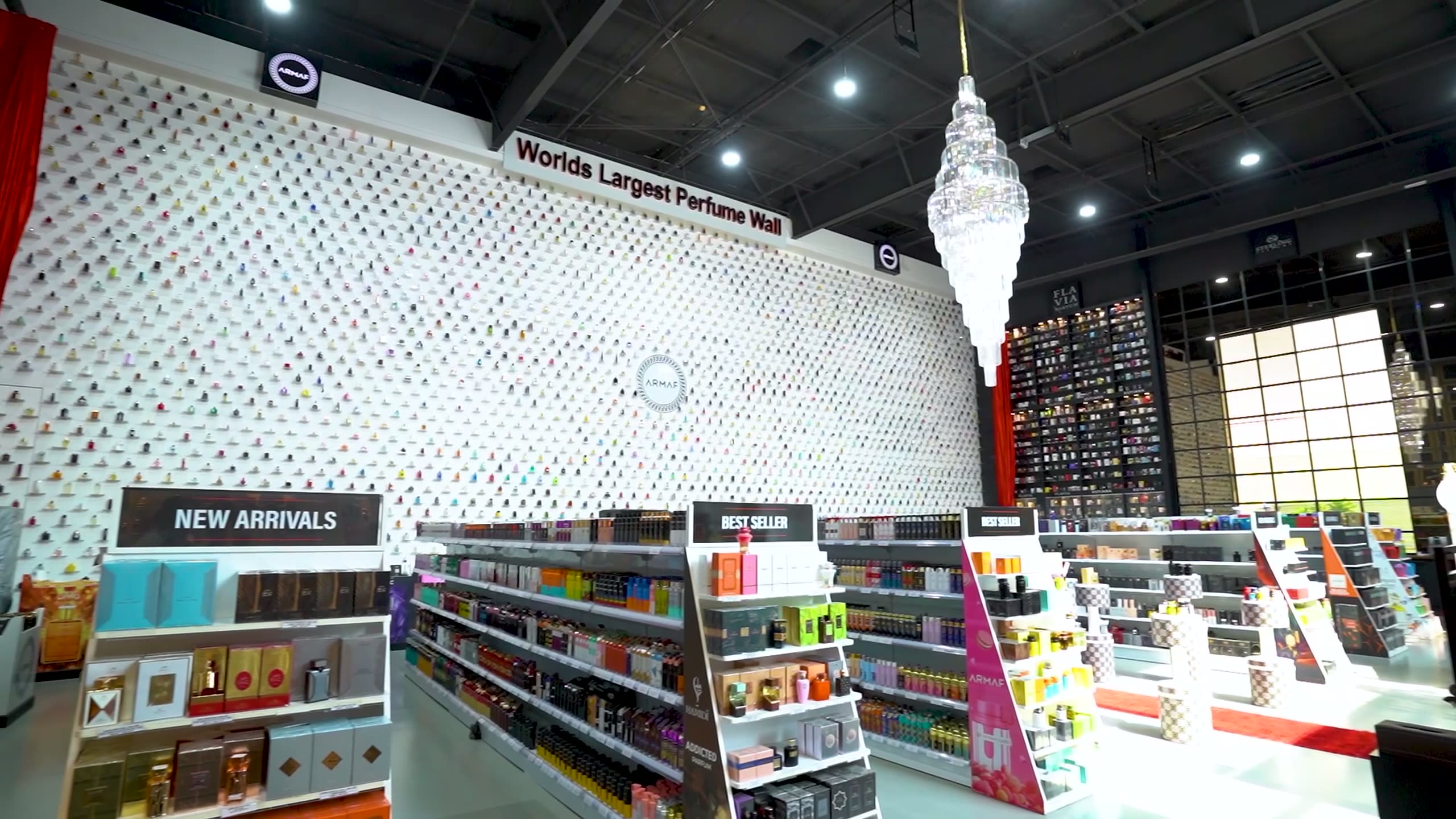 A walk through a completed perfume retail fit-out, past a full-height display wall